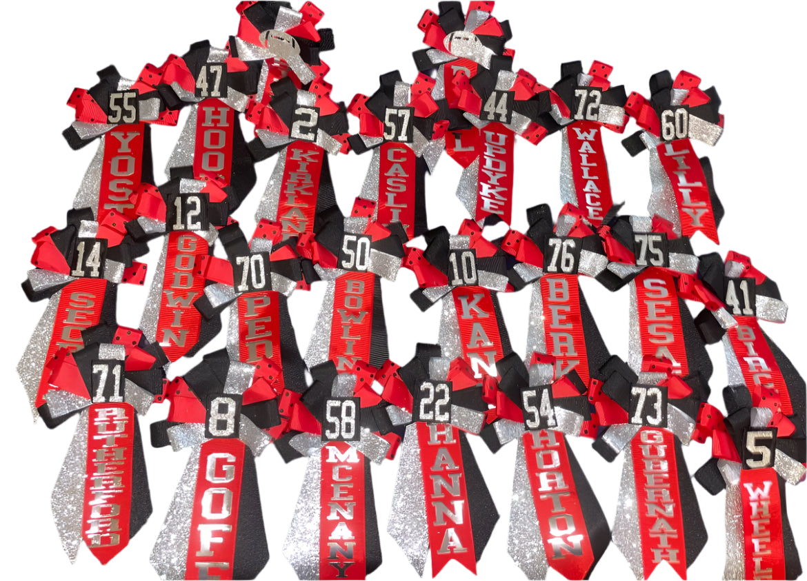 Custom number ribbon corsages.